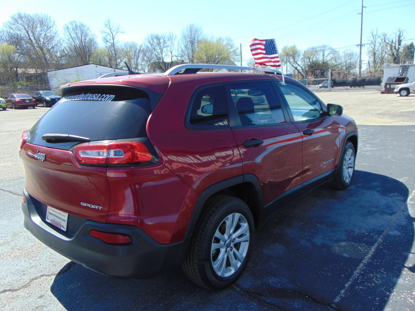 2015 Red Jeep Cherokee (1C4PJLAB2FW) with an 4-Cyl 2.4 Liter engine, Automatic, 9-Spd transmission, located at 2105 Dixie Hwy, Louisville, KY, 40210, (502) 772-3333, 38.220932, -85.795441 - Photo#11